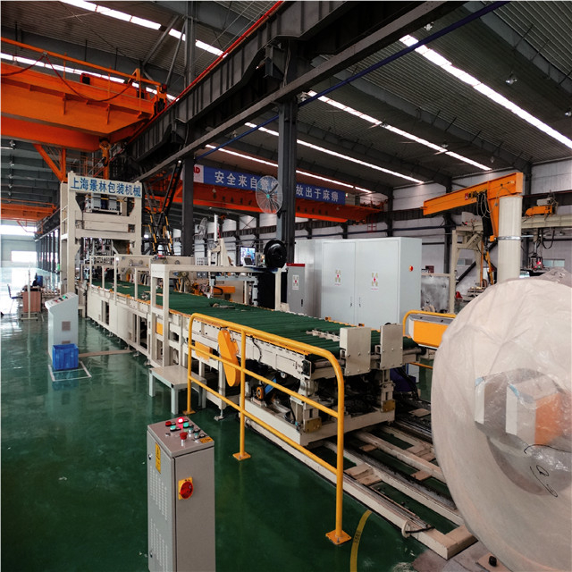 Línea automática de envasado de bobinas horizontales